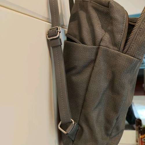 Slang backpack like new gray with multiple compartments