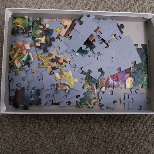 Puzzle 100 pieces used with dinosaur theme Trefl