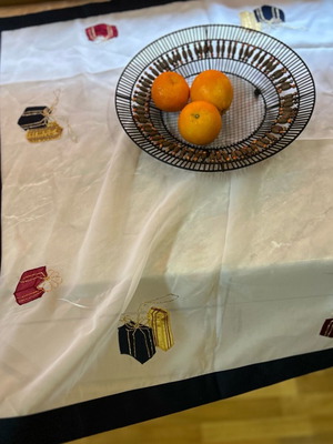 White delicate tablecloth with embroidered gift designs, new