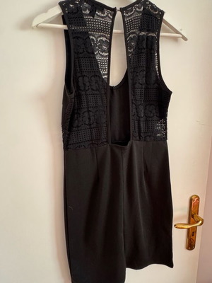 Little black dress used, black with lace effect and neckline