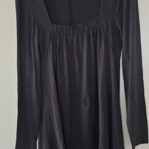 Black long-sleeve blouse with a square bust