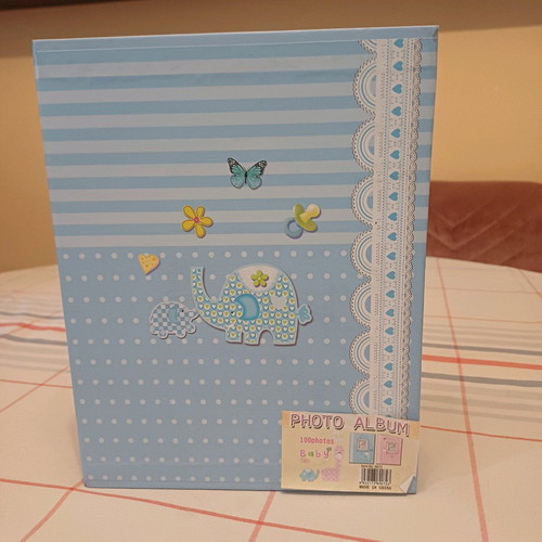 Photo album for boy like new, A4 size, 100 photos capacity
