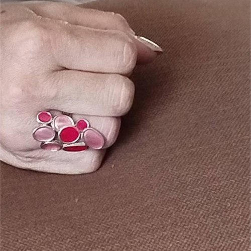 Ring used with enamel and steel base in pink shades