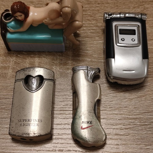Collection of 25 used vintage lighters and 3 matchboxes from hotels and restaurants