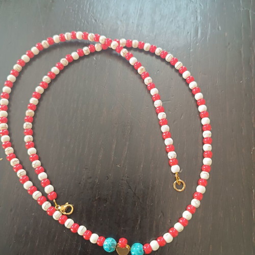 Handmade necklace with white, red beads and turquoise detail