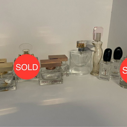Collection of 44 empty genuine perfume bottles, various brands