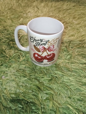 Coffee mug with cherry design glass like new