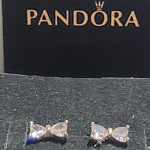 Pandora bow stud earrings with pink zirconia