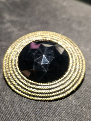 Vintage brooch with black stone