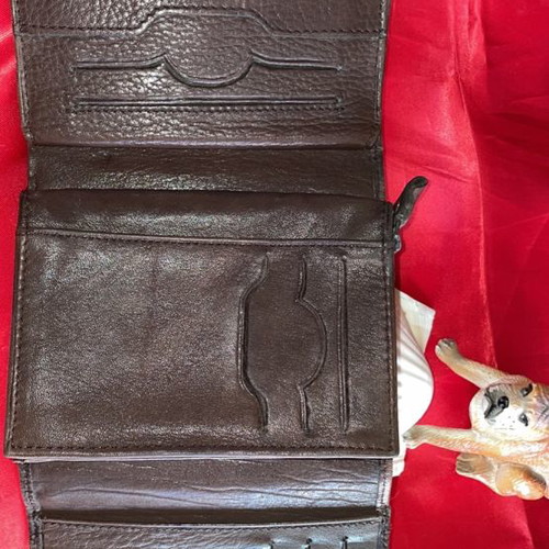 Brown leather wallet used with multiple compartments