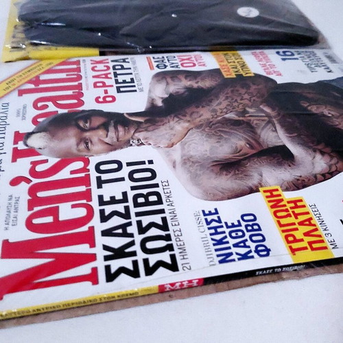 Men's Health July 2011 issue sealed with Body Action swimwear gift