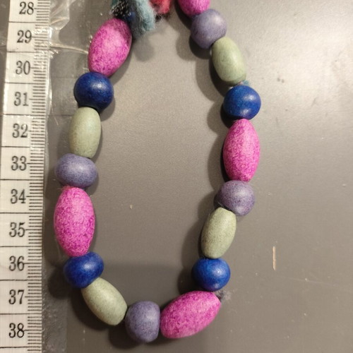 Boho handmade necklace with knitted yarn and beads
