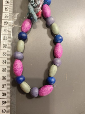 Boho handmade necklace with knitted yarn and beads