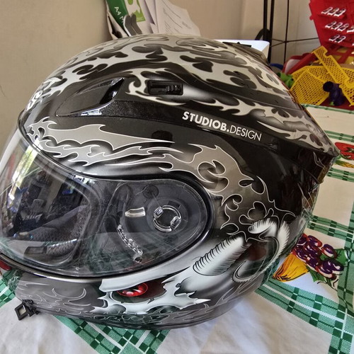 Zeus Full-Face Helmet with Custom Skull Tribal Graphics used