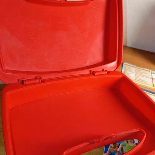 Playmobil cases used with cards and brochures