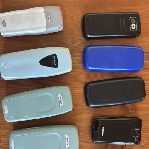 Set of 8 used button phones