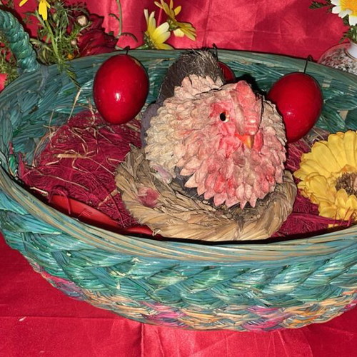 Woven Easter basket like new with hen and 3 red eggs