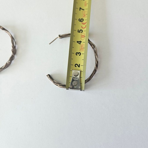 Woven hoop earrings used, bronze by Anna Maria Mazaraki