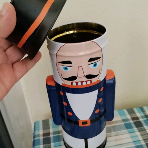 Tin Nutcracker box used with small dent