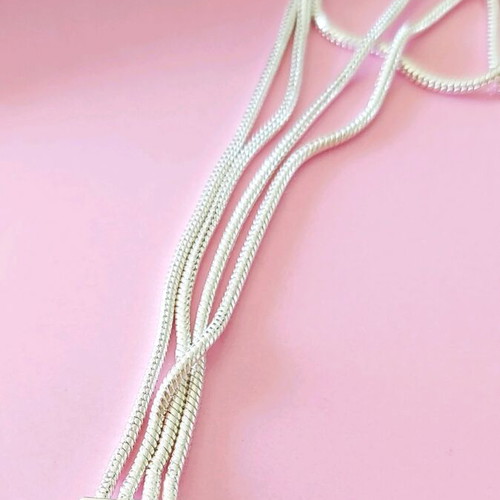 Pandora s925Ale Reflexions bracelet with four strands.