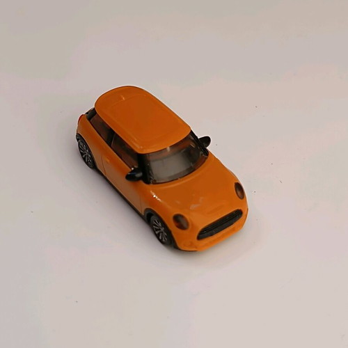 Toy car used, orange plastic, 4 cm miniature