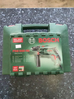 Bosch PSB 650 RE hammer drill new with case and 15 X-LINE drill bits