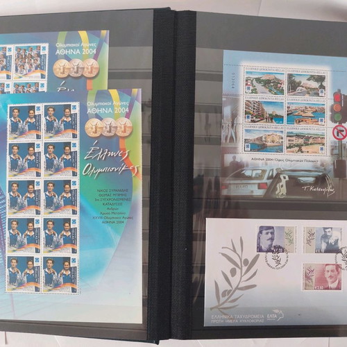 Leuchtturm stamp album with unused 2004 Olympic Games stamps used