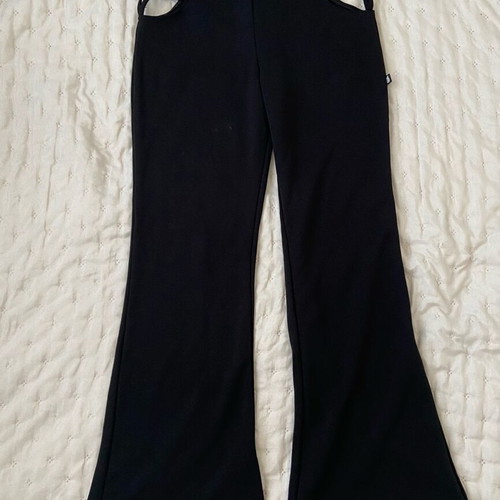 Flare-leg pants with star cutout like new, size M