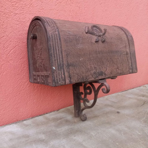 Cast iron mailbox used with metal base for wall or pole mounting
