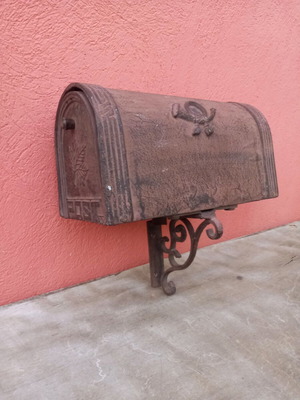 Cast iron mailbox used with metal base for wall or pole mounting