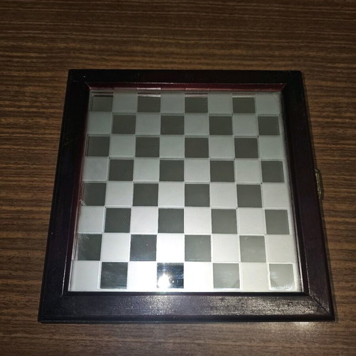 Glass vintage chess set used with mirror board and pieces