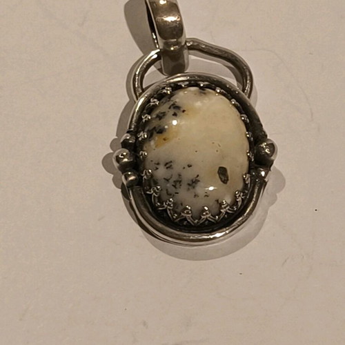 Silver handmade pendant with dendritic opal like new