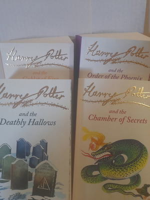 Harry Potter Bloomsbury Signature Edition books like new, 4 volumes in English