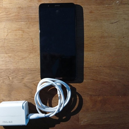 Huawei smartphone 2018 model, black, with 2 extra chargers