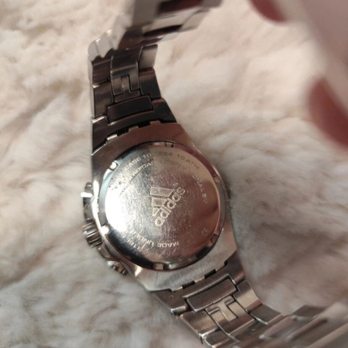 Adidas wristwatch used, silver color