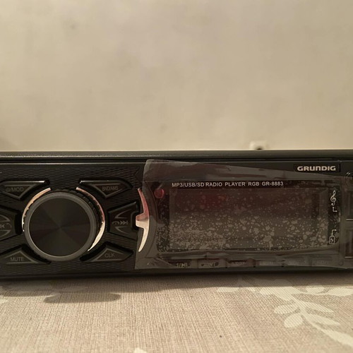 Grundig Automotive MP3 Radio Player new with remote control