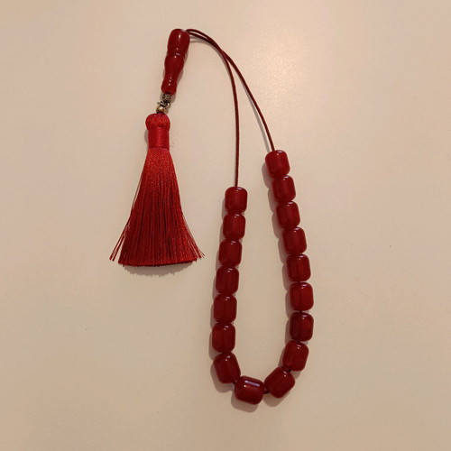 Red Kompoloi like new from Middle East with 17 beads and tassel