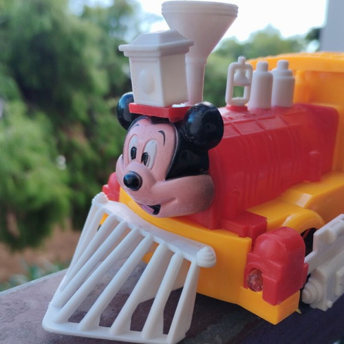 Mickey train vintage with movement and whistle, includes battery