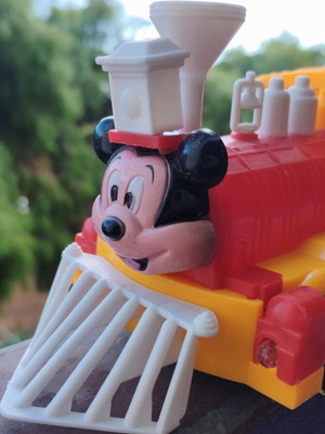 Mickey train vintage with movement and whistle, includes battery