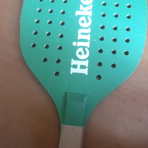 Heineken wooden promotional paddle with color defect