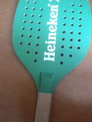 Heineken wooden promotional paddle with color defect