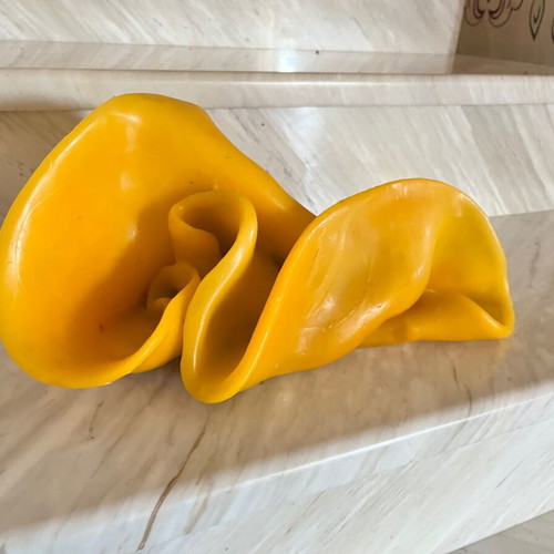 Handmade decorative candle with irregular shape, like new, yellow