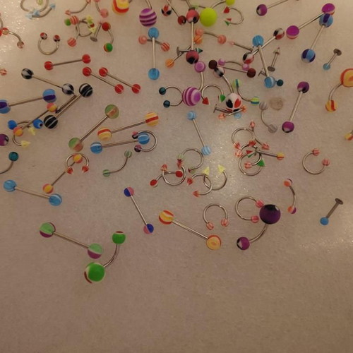 Piercing earrings set like new, 100 pieces, various designs and colors
