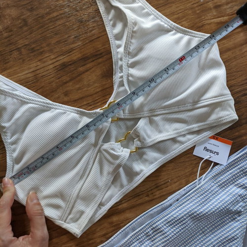 Bikini new, white top with gold heart details and baby blue bottom XS