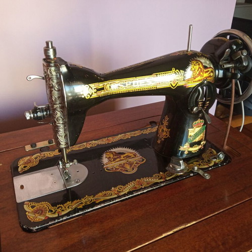Mrsedes sewing machine used with antique furniture