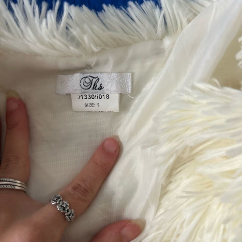 Synthetic white fur used in excellent condition
