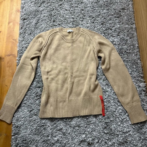 Beige knitted Naf Naf sweater used with striped cuffs and hem