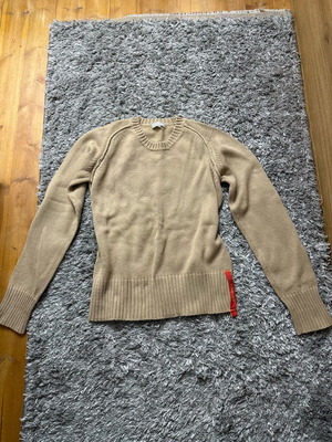 Beige knitted Naf Naf sweater used with striped cuffs and hem