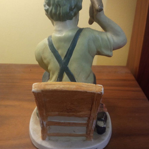 Decorative blacksmith figure used with nice coloring