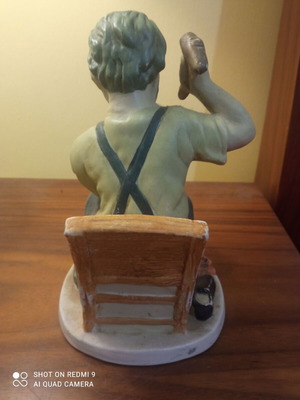 Decorative blacksmith figure used with nice coloring